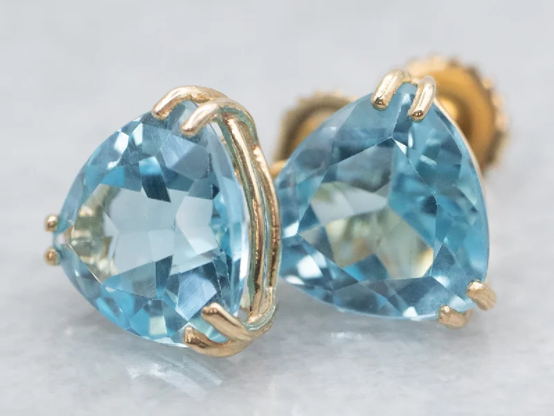 ladies earrings crystal-Trillion Cut Blue Topaz Stud Earrings