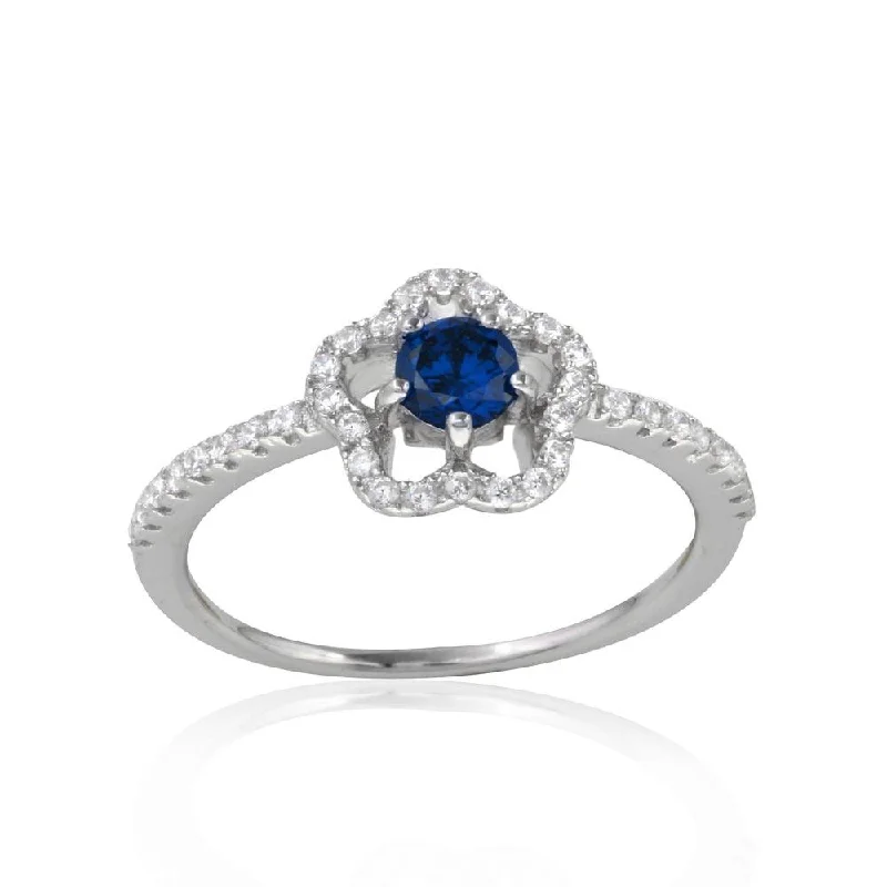 ladies ring crystal gold-Rhodium Plated 925 Sterling Silver Clover Micropave Ring with Blue Center CZ and Clear Round CZ - BGR01120BLU