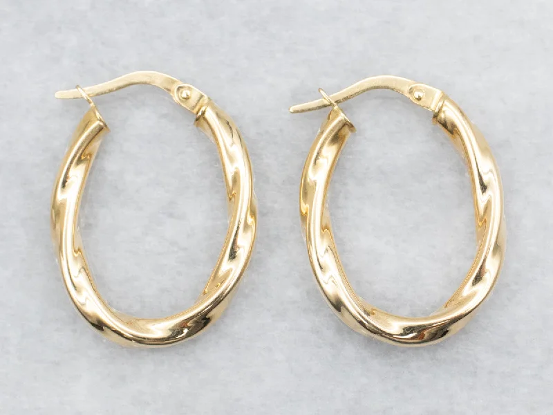 ladies earrings lightweight rose gold-Oval Gold Twist Hoop Earrings