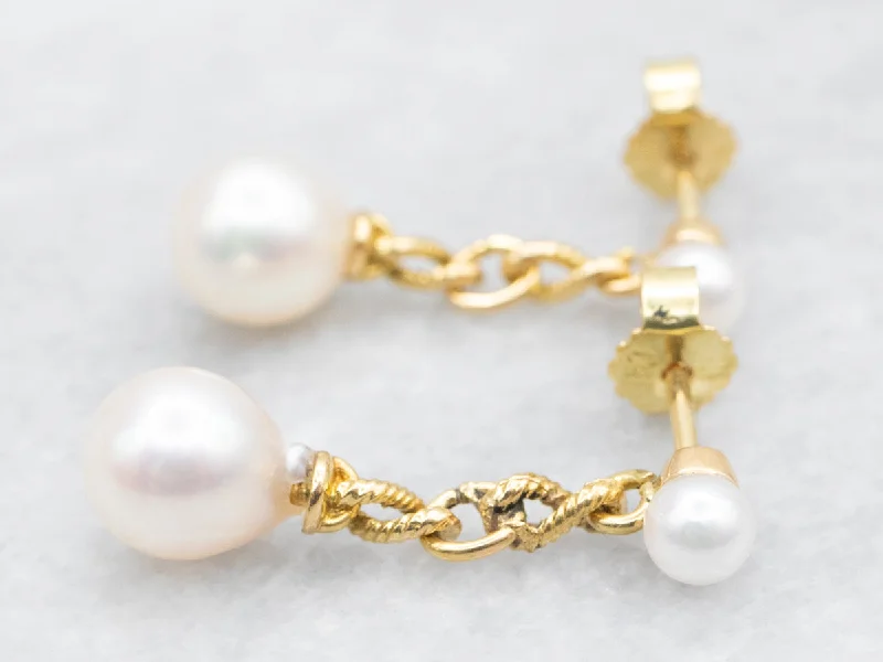 ladies earrings tropical gold-Twisting Gold Pearl Drop Earrings