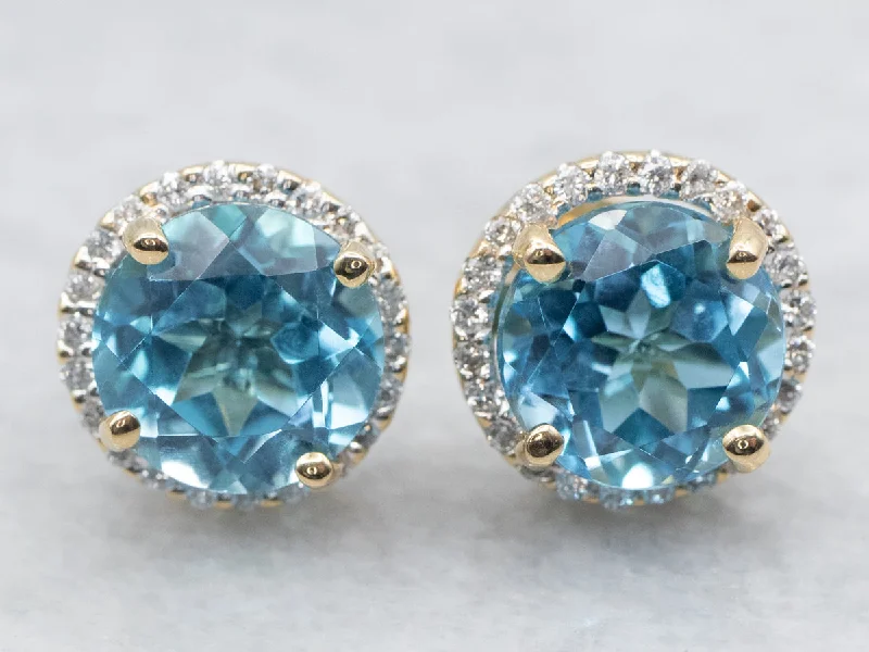 ladies earrings gothic platinum-Yellow Gold Blue Topaz and Diamond Halo Stud Earrings