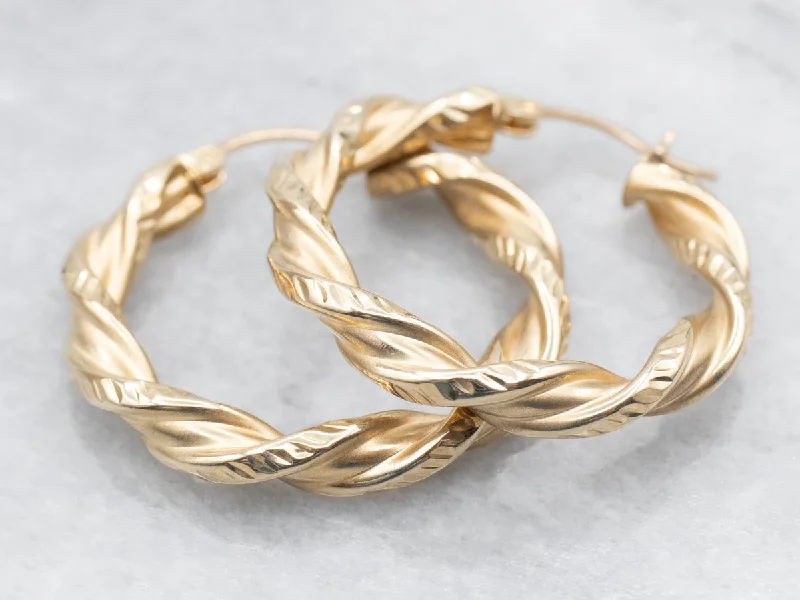 ladies earrings curved-Textured Gold Twisted Hoop Earrings