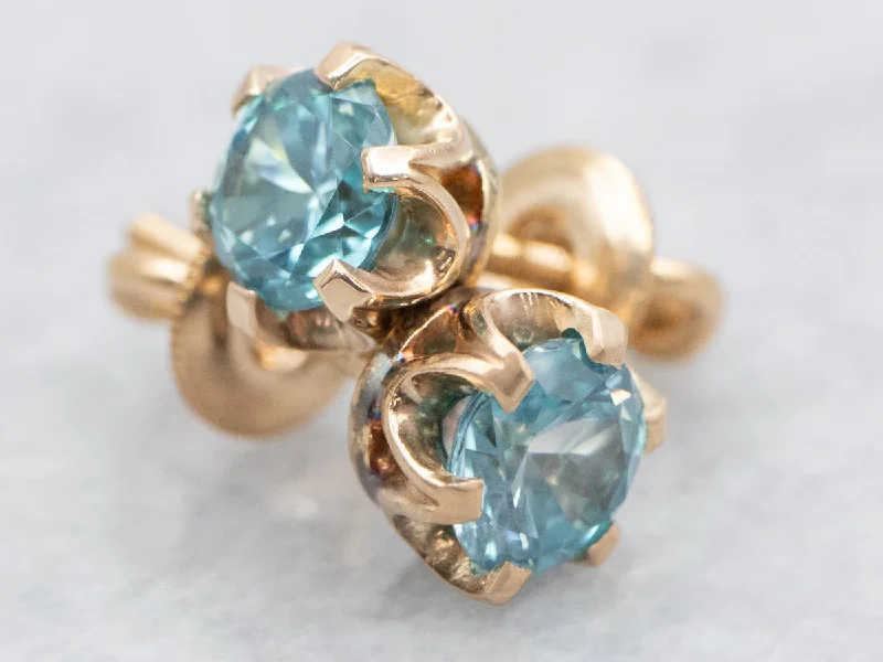 ladies earrings rose gold-Screwback Blue Zircon Stud Earrings in Gold Buttercup Setting