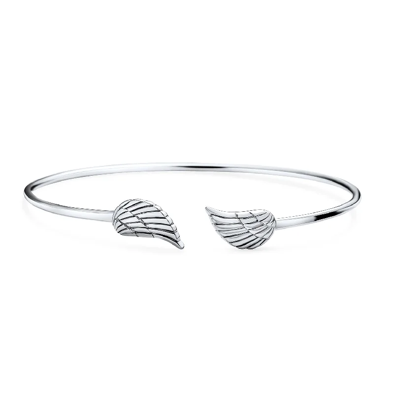 Ladies bracelets uniform width styles-Dainty Guardian Angel Wing Feather Cuff Bracelet in Sterling Silver